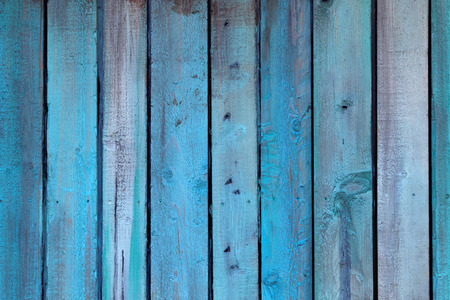 Weathered blue wall made of woodの写真素材