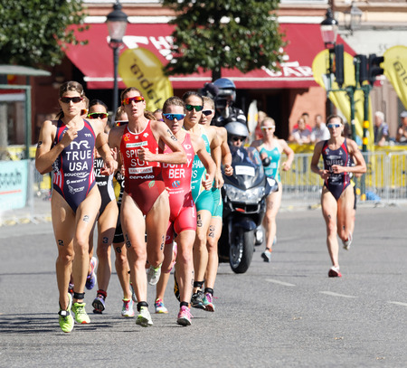 STOCKHOLM - AUG 22, 2015: Triathlete Sarah True running, followed by Nicola Spirig, Rachel Klamer and Flora Duffy in the Women's ITU World Triathlon series event August 22, 2015 in Stockholm, Swedenのeditorial素材