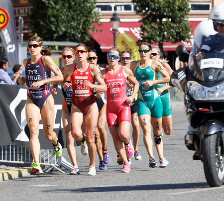 STOCKHOLM - AUG 22, 2015: Triathlete Sarah True running, followed by Nicola Spirig, Rachel Klamer and Flora Duffy in the Women's ITU World Triathlon series event August 22, 2015 in Stockholm, Swedenのeditorial素材