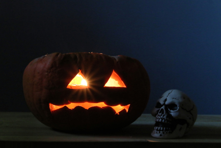 Halloween pumpkins and scullの写真素材