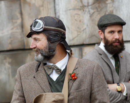 STOCKHOLM - SEPT 19, 2015: Two men wearing wearing old fashioned tweed clothes in the Bike in Tweed event September 19, 2015 in Stockholm, Swedenのeditorial素材