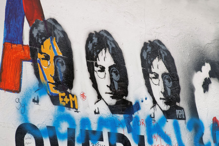 PRAGUE, CZECHIA - DEC 05, 2015: The colorful public John Lennon Wall where there is a continous graffiti painting going on by tourists. December 05, 2015 in Prague, Czechiaのeditorial素材