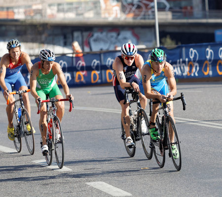 STOCKHOLM, SWEDEN - AUG 23, 2015: Danylo Sapunov, Cesar Saracho and others cycling in the Men's ITU World Triathlon series event August 23, 2015 in Stockholm, Swedenのeditorial素材