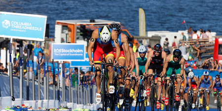 STOCKHOLM, SWEDEN - AUG 23, 2015: Spanish triathlon competitors Javier Gomez Noya and Vincente Hernandez cycling uphill in the Men's ITU World Triathlon series event August 23, 2015 in Stockholm, Swedenのeditorial素材