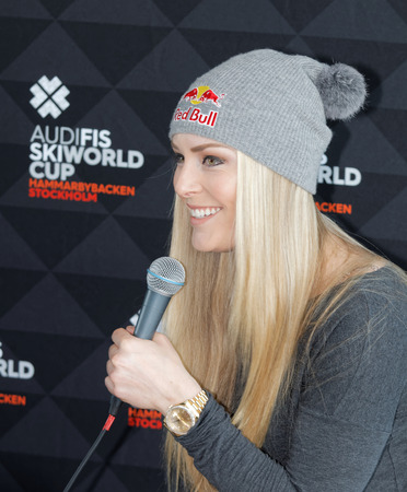 STOCKHOLM, SWEDEN - FEB 23, 2016: Smiling Lindsey Vonn holding microphone at the press conference before the Audi FIS Alpine Ski World Cup - Men's and Woman's city event February 23, 2016, Stockholm, Swedenのeditorial素材
