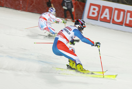 STOCKHOLM, SWEDEN - FEB 23, 2016: Alexander Khoroshilov (RUS) and competitor skiing at the FIS Alpine Ski World Cup - city event February 23, 2016, Stockholm, Swedenのeditorial素材
