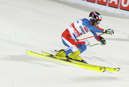 STOCKHOLM, SWEDEN - FEB 23, 2016: Side view of Alexander Khoroshilov (RUS)  skiing at the FIS Alpine Ski World Cup - city event February 23, 2016, Stockholm, Swedenのeditorial素材