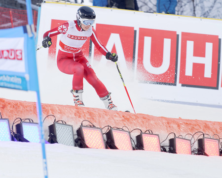 STOCKHOLM, SWEDEN - FEB 23, 2016: One female skiier in red at the FIS Alpine Ski World Cup - city event February 23, 2016, Stockholm, Swedenのeditorial素材