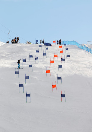 STOCKHOLM, SWEDEN - FEB 23, 2016: Slalom slope Hammarbybacken with colorful orange and blue gates at the FIS Alpine Ski World Cup - city event February 23, 2016, Stockholm, Swedenのeditorial素材
