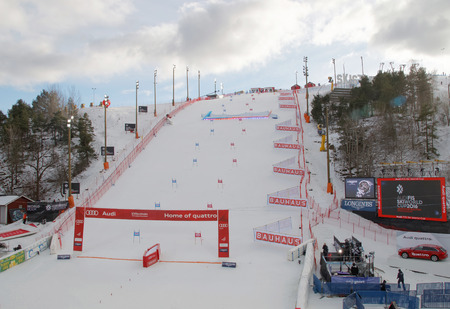STOCKHOLM, SWEDEN - FEB 23, 2016: Slalom slope Hammarbybacken with colorful orange and blue gates at the FIS Alpine Ski World Cup - city event February 23, 2016, Stockholm, Swedenのeditorial素材