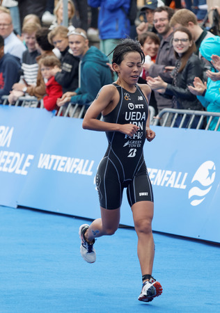 STOCKHOLM - JUL 02, 2016: Triathlete Ai Ueda (JPN) running at the finish in the Women's ITU World Triathlon series event July 02, 2016 in Stockholm, Swedenのeditorial素材