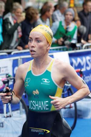 STOCKHOLM - JUL 02, 2016: Triathlete Charlotte McShane running in the transition zone in the Women's ITU World Triathlon series event July 02, 2016 in Stockholm, Swedenのeditorial素材