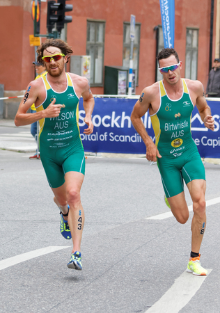 STOCKHOLM - JUL 02, 2016: Running australian triathletes Birtwistle and Wilson in a curve in the Men's ITU World Triathlon series event July 02, 2016 in Stockholm, Swedenのeditorial素材