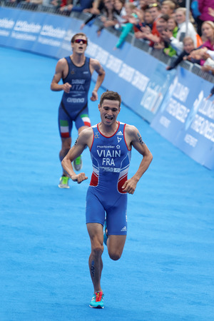 STOCKHOLM - JUL 02, 2016: Running triathlete Simon Vain at the finish in the Men's ITU World Triathlon series event July 02, 2016 in Stockholm, Swedenのeditorial素材