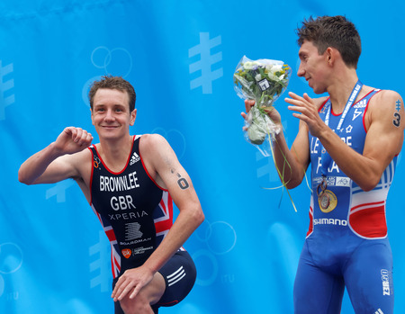 STOCKHOLM - JUL 02, 2016: The smiling triathlete medalist Alistair and Pierre Le Corre on the podium in the Men's ITU World Triathlon series event July 02, 2016 in Stockholm, Swedenのeditorial素材