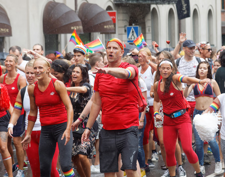 STOCKHOLM, SWEDEN - JUL 30, 2016: Group of dancing people from the Friskis & Svettis organisation in the Pride parade July 30, 2016 in Stockholm, Swedenのeditorial素材