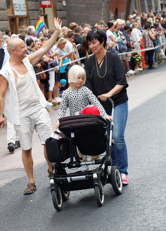 STOCKHOLM, SWEDEN - JUL 30, 2016: The swedish politician Mona Sahlin and Jonas Gardell in the Pride parade July 30, 2016 in Stockholm, Swedenのeditorial素材