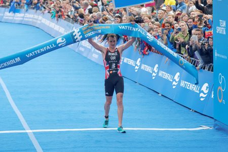 STOCKHOLM - JUL 02, 2016: Triathlete Alistair Brownlee winning the race in the Men's ITU World Triathlon series event July 02, 2016 in Stockholm, Swedenのeditorial素材
