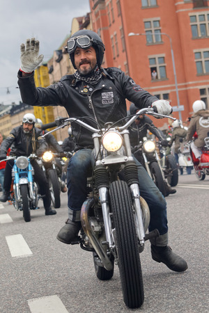 STOCKHOLM, SWEDEN - SEPT 03, 2016: Closeup of old fashioned motorcycles and bikers at the Mods vs Rockers event at the St:Eriks bridge, Stockholm, Sweden, September 02, 2016のeditorial素材