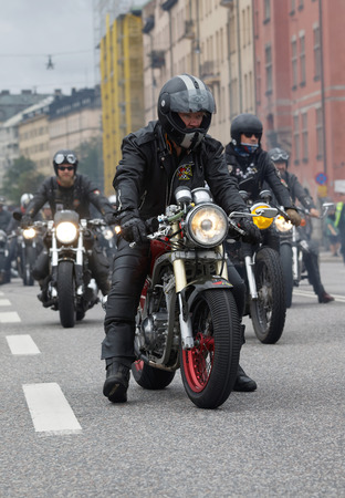STOCKHOLM, SWEDEN - SEPT 03, 2016: Closeup of old fashioned motorcycles and bikers at the Mods vs Rockers event at the Saint Eriks bridge, Stockholm, Sweden, September 02, 2016のeditorial素材