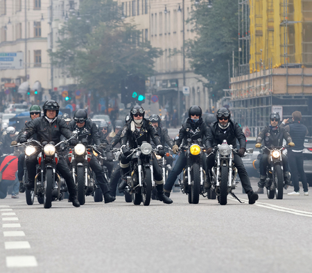 STOCKHOLM, SWEDEN - SEPT 03, 2016: Group of bikers on old fashioned motorcycles at the Mods vs Rockers event at the Saint Eriks bridge, Stockholm, Sweden, September 02, 2016のeditorial素材