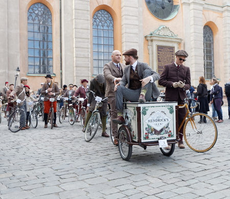 STOCKHOLM - SEPT 24, 2016: Man sitting on a cycle used by gophers wearing old fashioned brown tweed clothes in the Bike in Tweed event September 24, 2016 in Stockholm, Swedenのeditorial素材