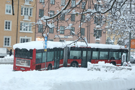 STOCKHOLM, SWEDEN - NOV 10, 2016: Snow chaos in the traffic in central Stockholm. Snow chaos in the traffic. A broken bus is abandoned. November 10, 2016 in Stockholm, Swedenのeditorial素材