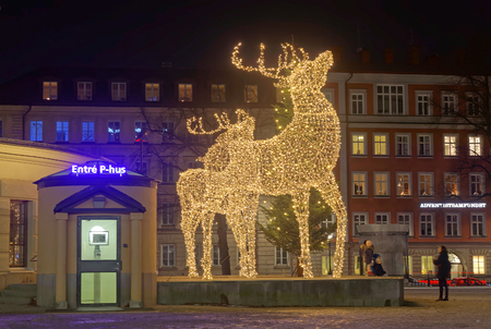 STOCKHOLM, SWEDEN - DEC 03 2016: Christmas reindeer made of led light in front of a building during night, Norra bantorget, Stockholm, Swedenのeditorial素材