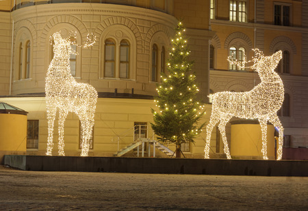 STOCKHOLM, SWEDEN - DEC 03 2016: Christmas reindeer made of led light in front of a building during night, Norra bantorget, Stockholm, Swedenのeditorial素材