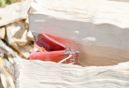 Closeup of a log splitter machine splitting a birch logの写真素材