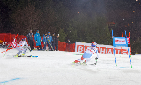STOCKHOLM, SWEDEN - JAN 31, 2017: Denise Feiereabend (SUI) and competitor  in the parallel slalom downhill skiing, at the Alpine Audi FIS Ski World Cup - city event January 31, 2017, Stockholm, Swedenのeditorial素材