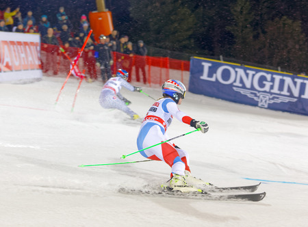 STOCKHOLM, SWEDEN - JAN 31, 2017: Denise Feiereabend (SUI) and competitor  in the parallel slalom downhill skiing, at the Alpine Audi FIS Ski World Cup - city event January 31, 2017, Stockholm, Swedenのeditorial素材