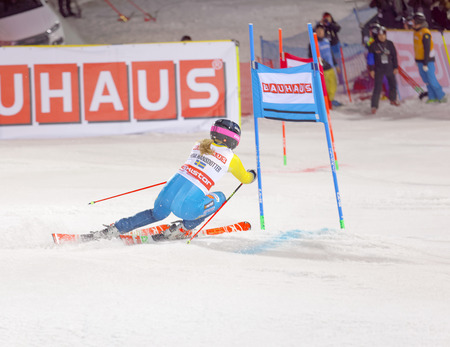 STOCKHOLM, SWEDEN - JAN 31, 2017: Rear view of Frida Hansdotter (SWE) in the parallel slalom downhill skiing, at the Alpine Audi FIS Ski World Cup - city event January 31, 2017, Stockholm, Swedenのeditorial素材
