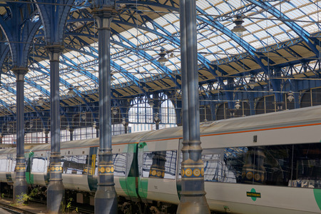 BRIGHTON, GREAT BRITAIN - FEB 24, 2017: Two trains in the beautiful old train station in Brighton, UK. February 24, 2017 in Brighton, Great Britainのeditorial素材