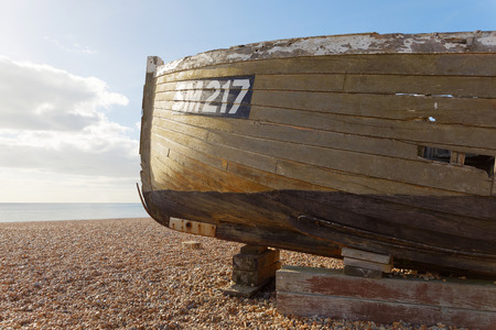 BRIGHTON, GREAT BRITAIN - FEB 24, 2017: Brighton beach, a boat in the foreground and the sea in the background. February 24, 2017 in Brighton, Great Britainのeditorial素材