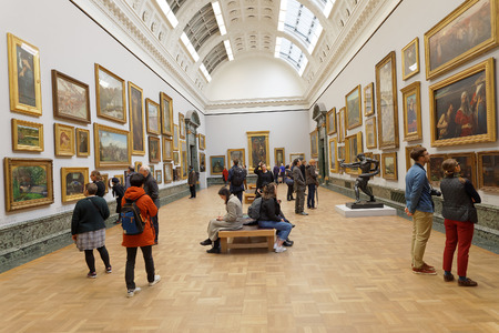 LONDON, GREAT BRITAIN - FEB 27, 2017: Interior of the museum Tate Britain. People watching...