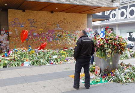 STOCKHOLM, SWEDEN - APR 12, 2017: Lots of flowers in central Stockholm from people paying respect to...