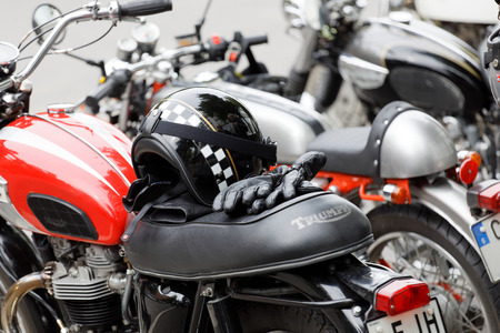 STOCKHOLM, SWEDEN - SEPT 02, 2017: Closeup of motorcycle helmet and gloves on a motor cycle at the Saint Eriks bridge, Stockholm, Sweden, September 02, 2017のeditorial素材
