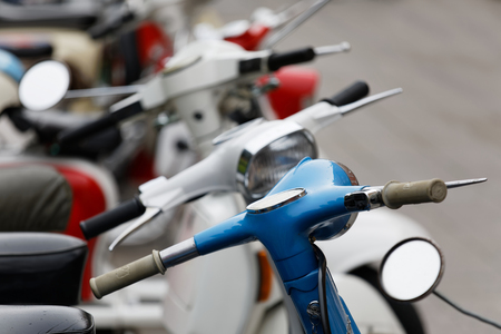 STOCKHOLM, SWEDEN - SEPT 02, 2017: Closeup of many handlebars on old fashioned classic vespa scooter at the Mods vs Rockers event at the Saint Eriks bridge, Stockholm, Sweden, September 02, 2017のeditorial素材