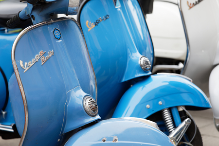 STOCKHOLM, SWEDEN - SEPT 02, 2017: Closeup of blue parked old fashioned classic vespa scooters at the Mods vs Rockers event at the Saint Eriks bridge, Stockholm, Sweden, September 02, 2017のeditorial素材