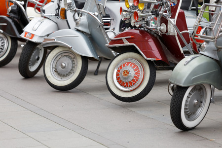 STOCKHOLM, SWEDEN - SEPT 02, 2017: Wheels of beautiful parked old fashioned vespa scooters at the Mods vs Rockers event at the Saint Eriks bridge, Stockholm, Sweden, September 02, 2017のeditorial素材