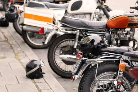 STOCKHOLM, SWEDEN - SEPT 02, 2017: Closeup of shiny oldfashioned retro motorcycles and helmets at the Mods vs Rockers event at the Saint Eriks bridge, Stockholm, Sweden, September 02, 2017のeditorial素材