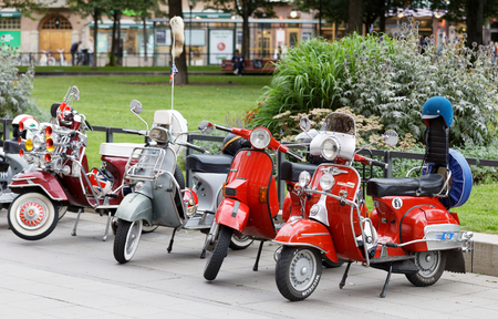 STOCKHOLM, SWEDEN - SEPT 02, 2017: Many parked retro vespa scooters in the city park at the Mods vs Rockers event at the Saint Eriks bridge, Stockholm, Sweden, September 02, 2017のeditorial素材