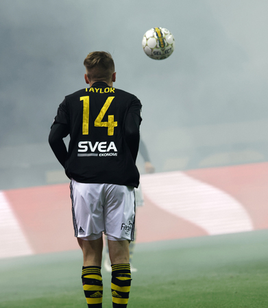 SOLNA SWEDEN - OCT 30, 2017: Soccer player making a throw-in. Robert Taylor (AIK) have the ball under control. October 30 2017,Solna,Swedenのeditorial素材
