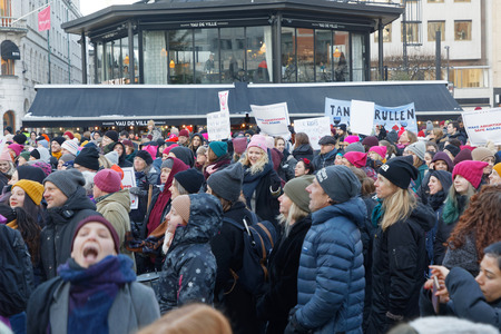STOCKHOLM, SWEDEN - JAN 21, 2018: Womens March, a worldwide protest for women's rights in central Stockholm, Norrmalmstorg, Sweden, January 21, 2018のeditorial素材
