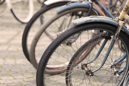 STOCKHOLM - SEPT 23, 2017: Closeup of the wheels of an old bicyces in the Bike in Tweed event September 23, 2017 in Stockholm, Swedenのeditorial素材