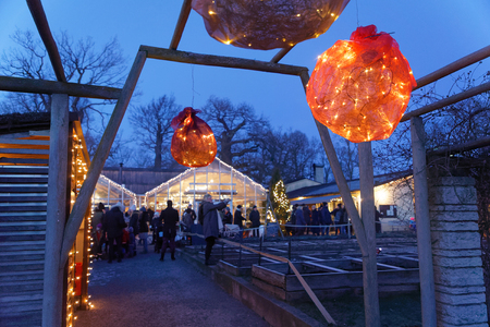 STOCKHOLM, SWEDEN - DEC 17, 2017: People visiting the Christmas Fair and fire show at Rosendal Garden in Stockholm, Sweden, December 17, 2017のeditorial素材