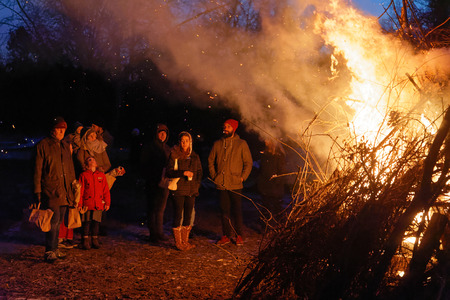 STOCKHOLM, SWEDEN - DEC 17, 2017: People looking at the bonfire at the fire show at Rosendal Garden...