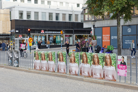 STOCKHOLM, SWEDEN - AUG 26, 2018: Political partys posters trying to get votes during the election campaign. Sweden, August 26, 2018 in central Stockholm, Swedenのeditorial素材