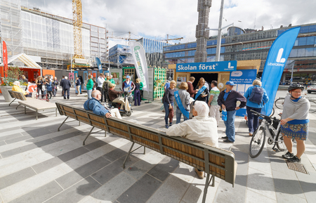 STOCKHOLM, SWEDEN - AUG 26, 2018: Political partys at their polling huts trying to get votes during the election campaign, August 26, 2018 in central Stockholm, Swedenのeditorial素材
